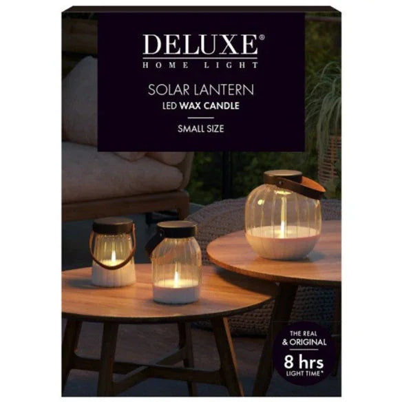 Solar lantaarn met LED-waskaars, sfeervol buiten op tafel, Nordic Flame LED-kaarsen